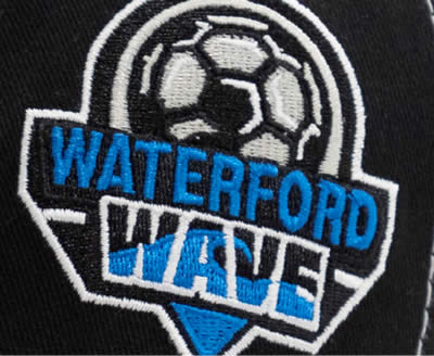 Waterford Wave soccer team logo featuring a soccer ball and waves.