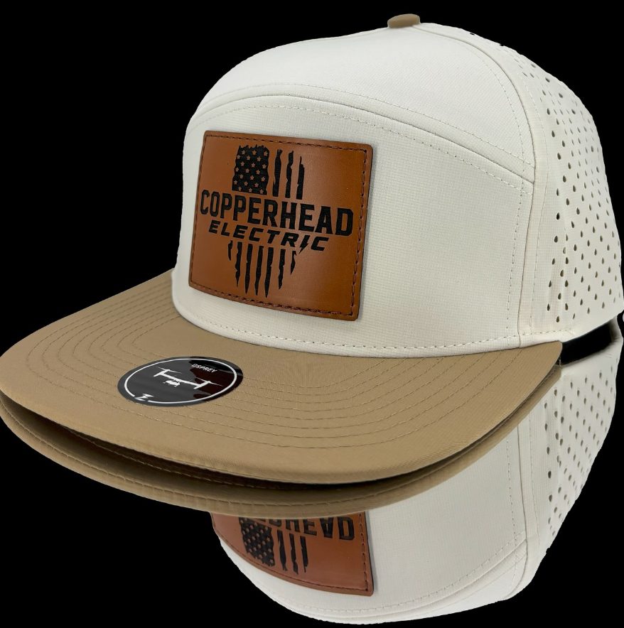 Beige and white snapback cap with leather logo patch.