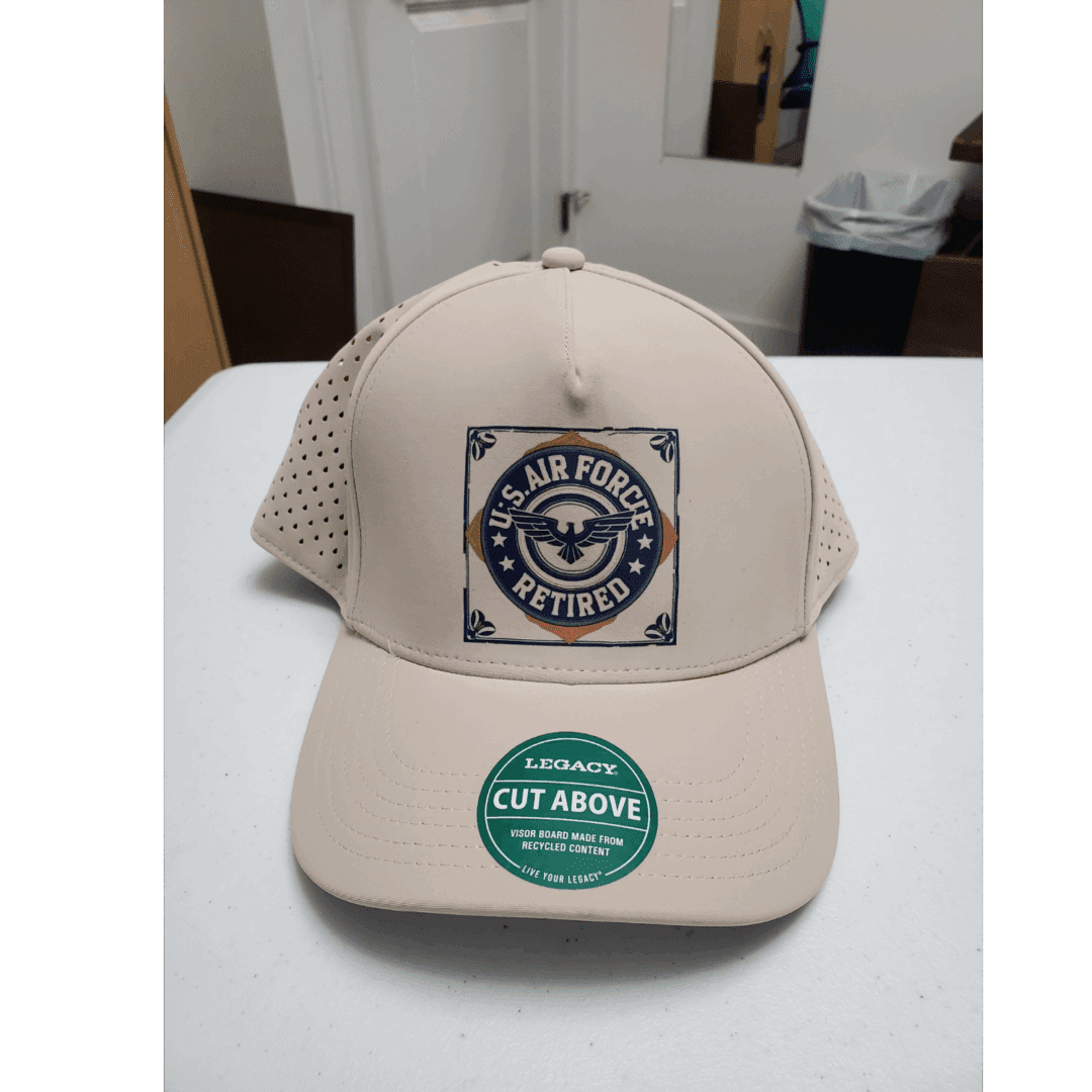 Beige trucker cap with a circular logo patch on the front.